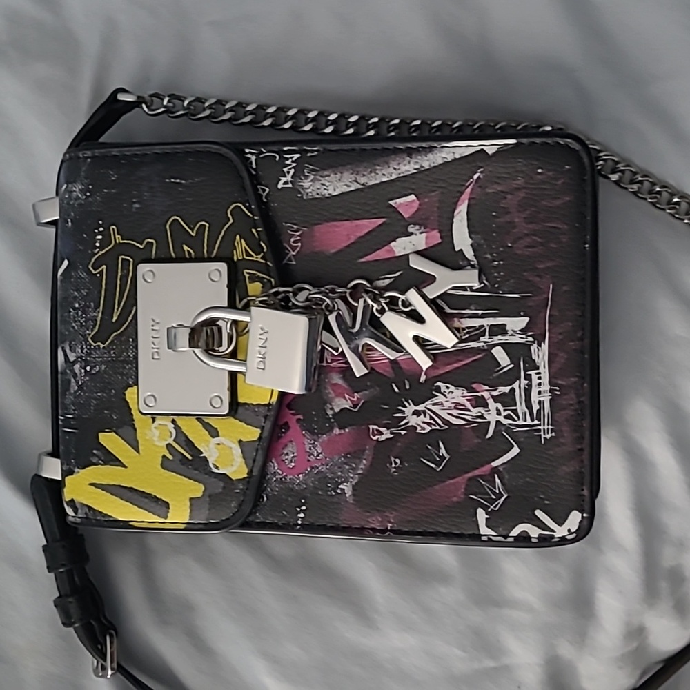 Small DKNY black purse with multicolored front